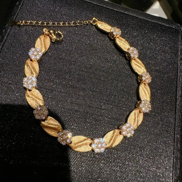 Italian Vintage Satin-Finish Flower Bracelet in Gold-Plated Brass with Zircon Accents